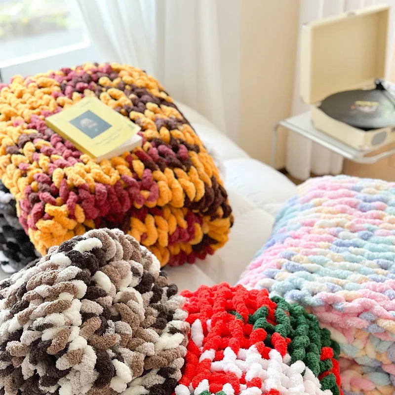Handmade thick striped chenille winter blanket on a bed, showing caramel mango colour and 130x170cm size.