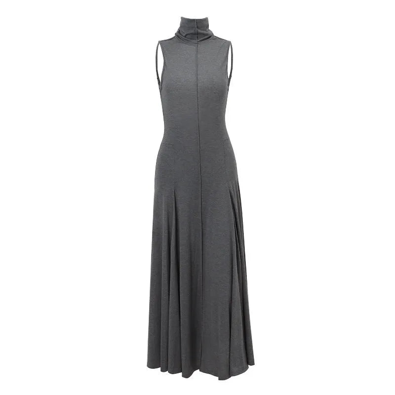 Grey women's slim-fit dress with half turtleneck, backless design, high waist, and sleeveless cut