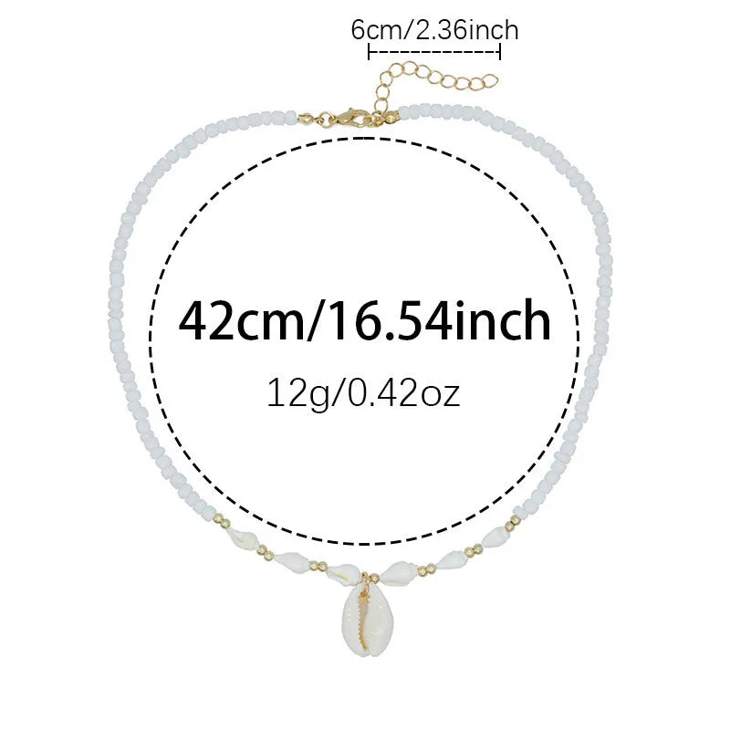 White conch shell bead necklace with a mother-of-pearl pendant on a regular chain.