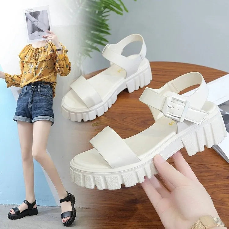 Women's beige peep toe ankle strap platform sandals with buckle fastening on wooden floor