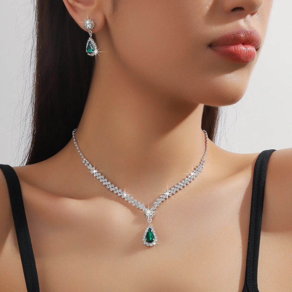 Claw chain necklace and earrings set with water drop rhinestones in multiple colour options