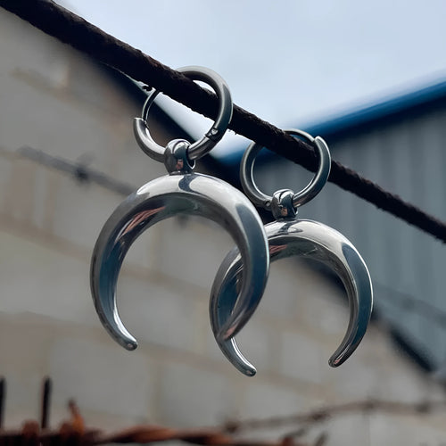 Silver alloy clip-on hoop earrings with gothic moon design and punk style geometric shape