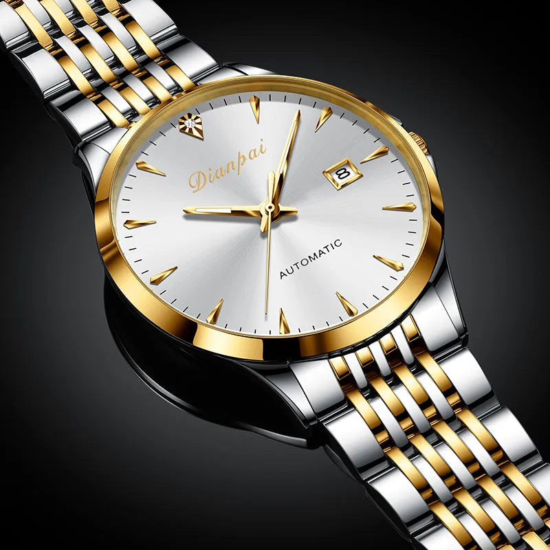 Men's simple dial automatic mechanical watch with stainless steel bracelet on a wrist.