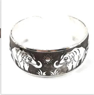 Miao silver openwork carved bracelet in alloy with Rome shape, ethnic design with turtle colour finish