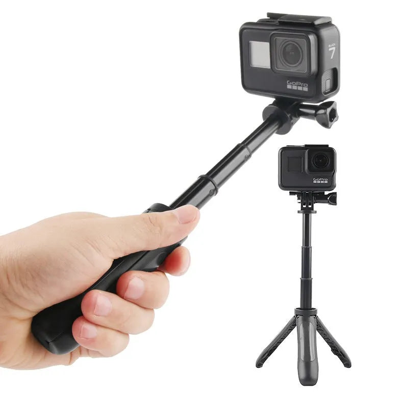Mini telescopic selfie stick tripod expanded to full height with smartphone attached, ABS silicone, available in four colours