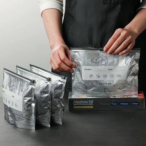 Pack of ten silver aluminium foil sealed storage bags in three different sizes on a white background.