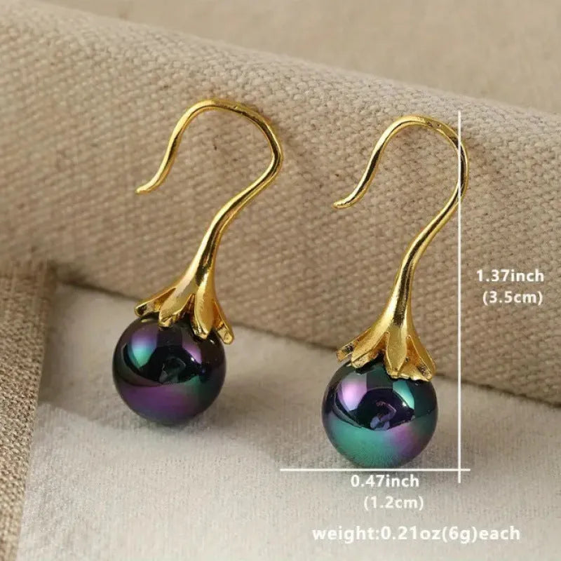 Gold electroplated retro fashion earrings for women with alloy construction