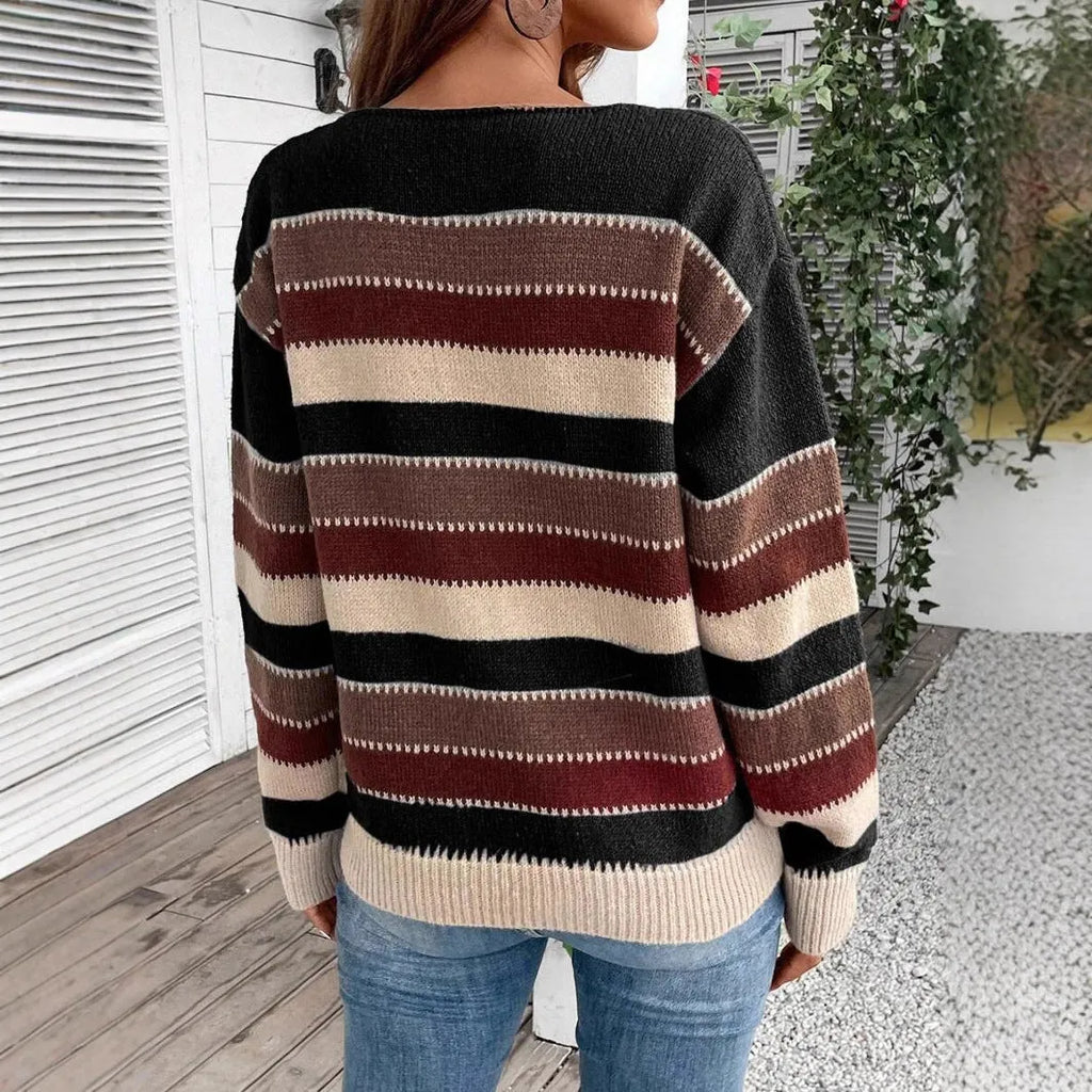 Women's colourblock striped pullover sweater in polyester, shown in black, blue, and grey.