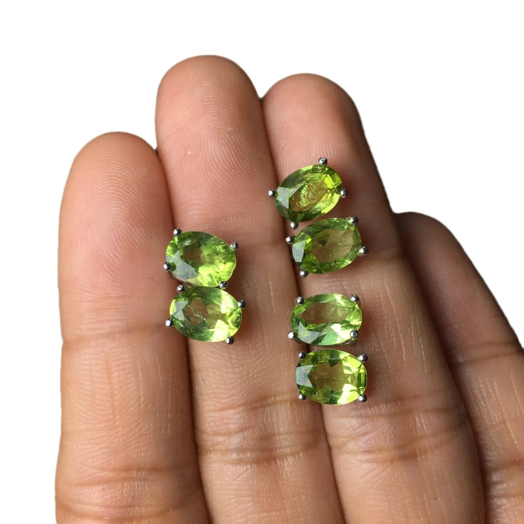 Natural grass green olivine faceted stud earrings in S925 silver, oval stone 6mm by 8mm.