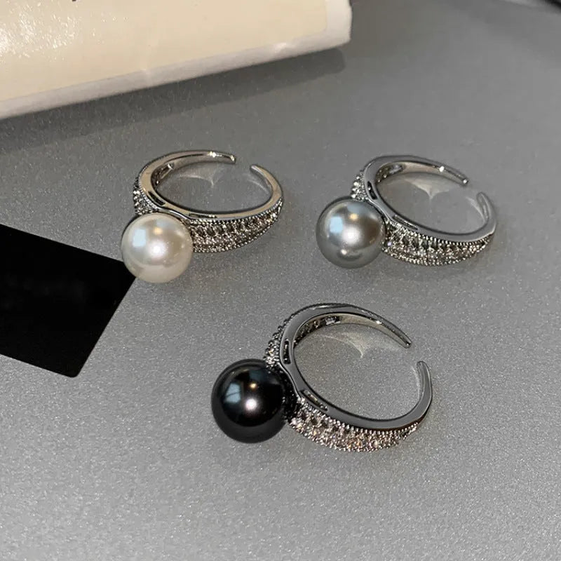 Geometric open copper ring for women with a black pearl style and adjustable opening