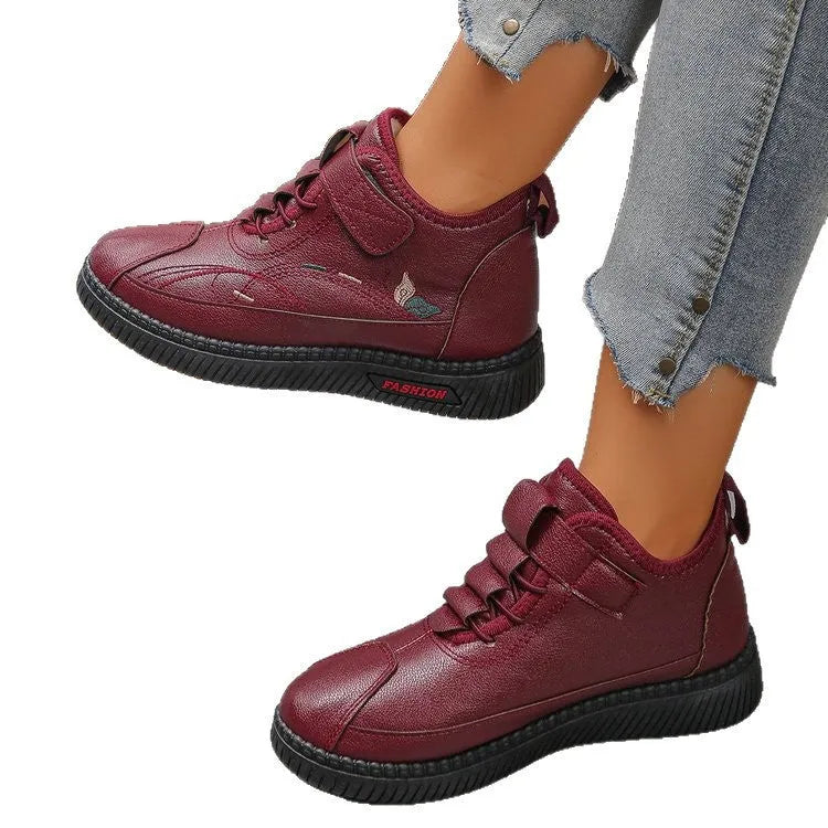 Women's black velvet house shoes with hollow-out design and rubber sole