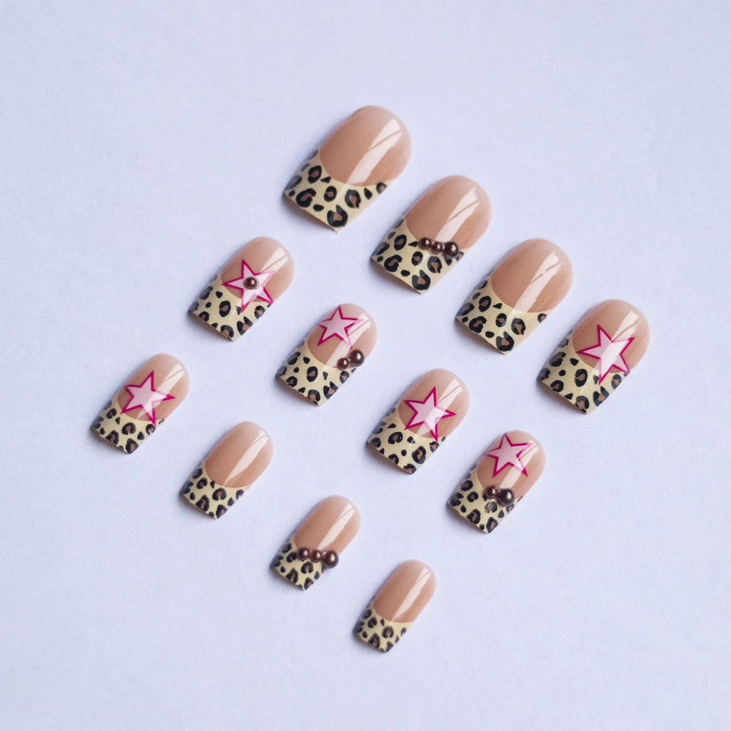 Leopard print French manicure nail art stickers with rhinestone pearls and metallic five-pointed star accessories