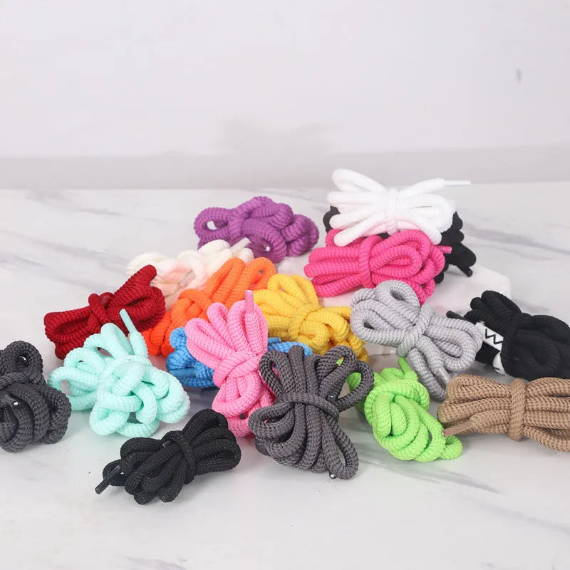 Flat oval woven shoelaces in various colours showing 1.0cm width and length options.