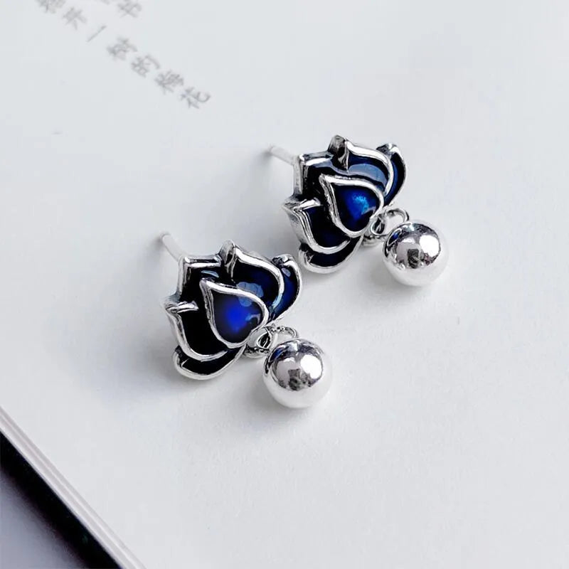 Blue lotus earrings with retro lotus seedpod tassel design in silver needle alloy, measuring 1.2cm wide