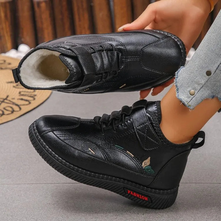Women's black velvet house shoes with hollow-out design and rubber sole