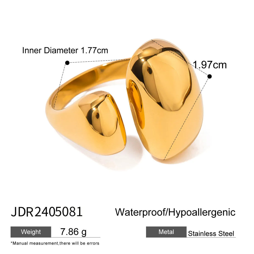 Women's exaggerated geometric open ring in stainless steel with electroplated finish.