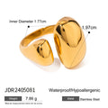 Women's exaggerated geometric open ring in stainless steel with electroplated finish.