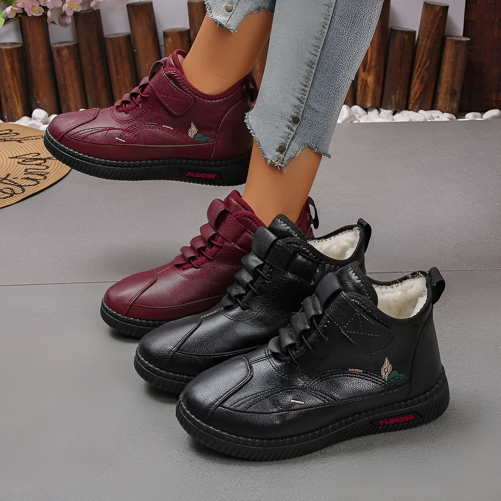 Women's black velvet house shoes with hollow-out design and rubber sole
