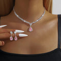 Claw chain necklace and earrings set with water drop rhinestones in multiple colour options