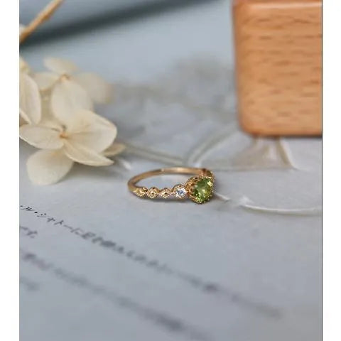 Japanese style geometric copper ring with quadrilateral design and green imitation peridot appearance