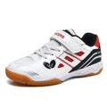 White and blue low-top PVC badminton shoes with round toe and ribbed sole.