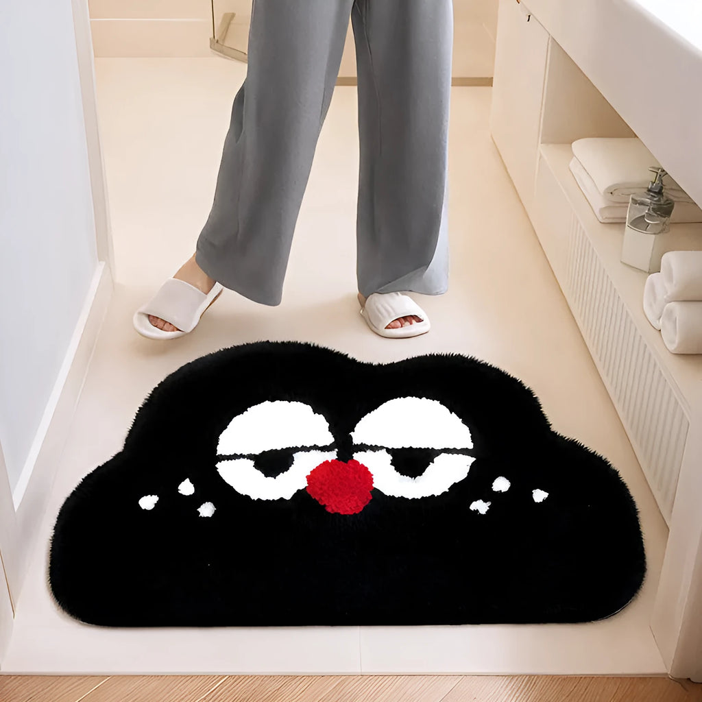 Big Eye Clouds cartoon anime bathroom mat in soft green, shown on a tiled bathroom floor.
