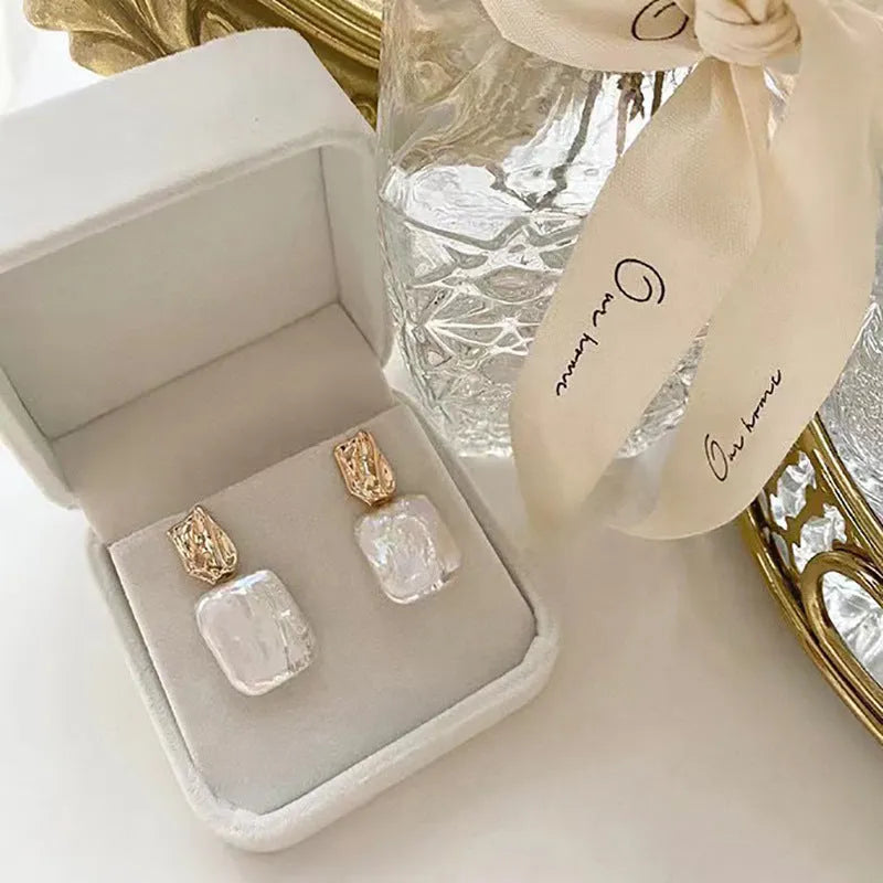 Natural freshwater pearl square stud earrings with geometric quadrilateral shape and alloy setting