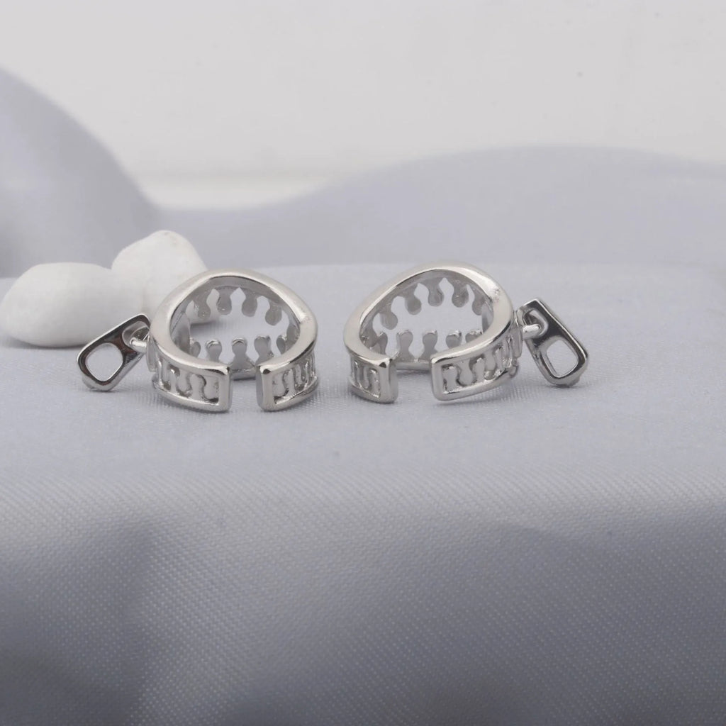 Copper geometric clip-on earrings with a simple zipper ear bone clip design in colour ES862.
