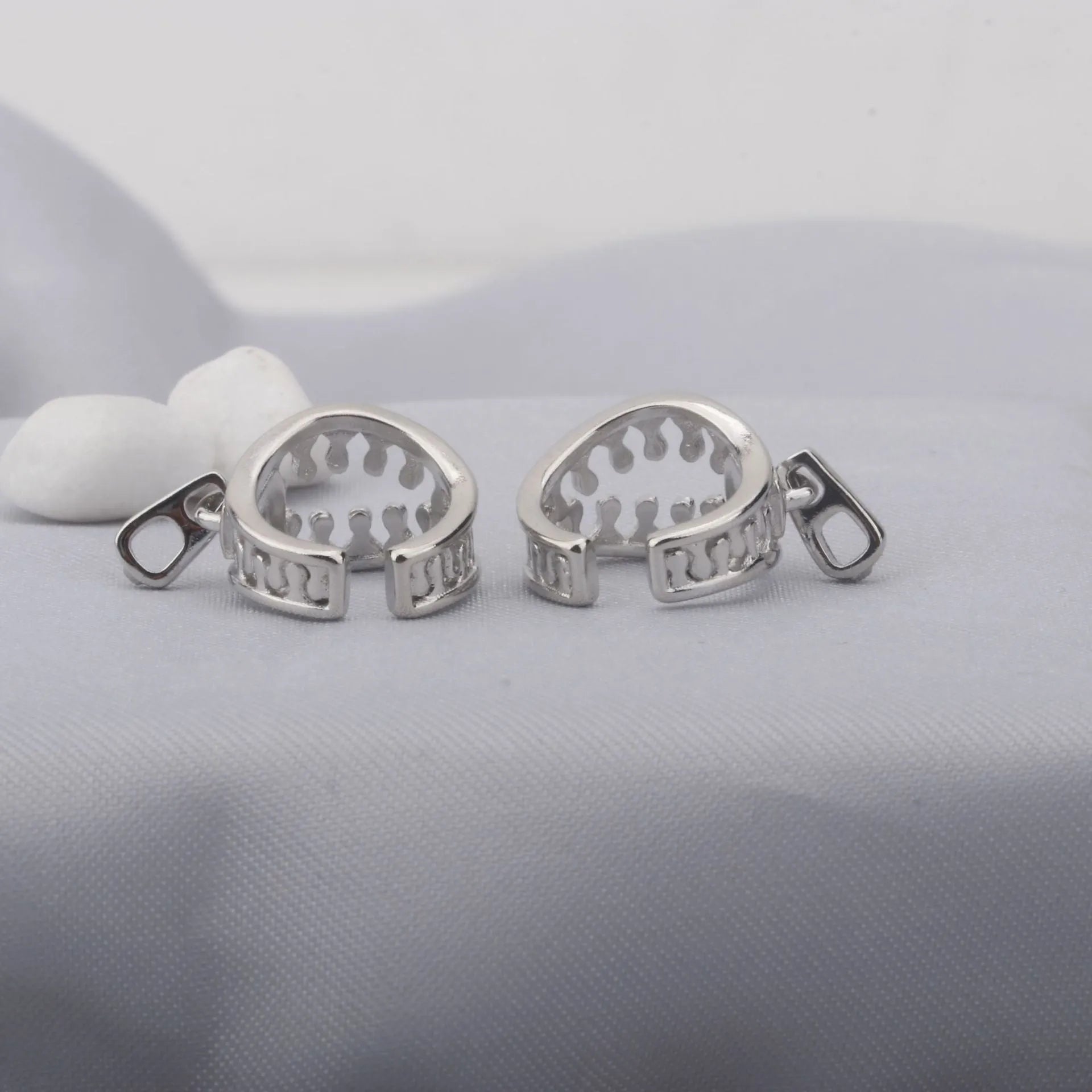 Copper geometric clip-on earrings with a simple zipper ear bone clip design in colour ES862.