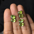 Natural grass green olivine faceted stud earrings in S925 silver, oval stone 6mm by 8mm.