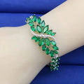 Gold plated copper bracelet with micro inlaid zircon ice flower design in blue, colour, green, purple or white
