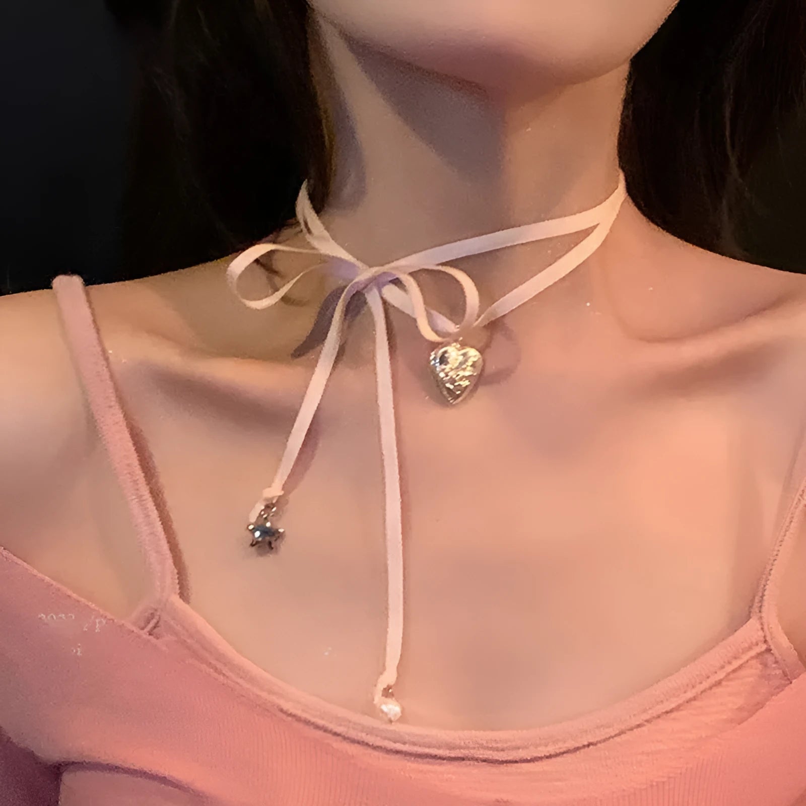 Women's alloy fashion necklace with love pendant and ribbon detail on clavicle chain