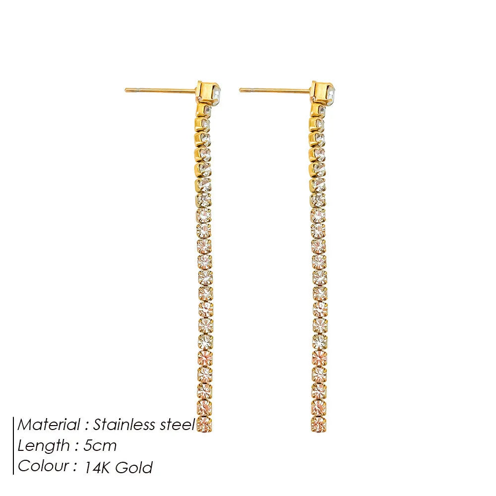 Geometric line pattern stainless steel stud earrings with zircon stones in gold colour.