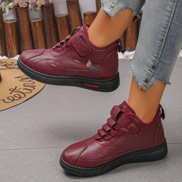 Women's black velvet house shoes with hollow-out design and rubber sole