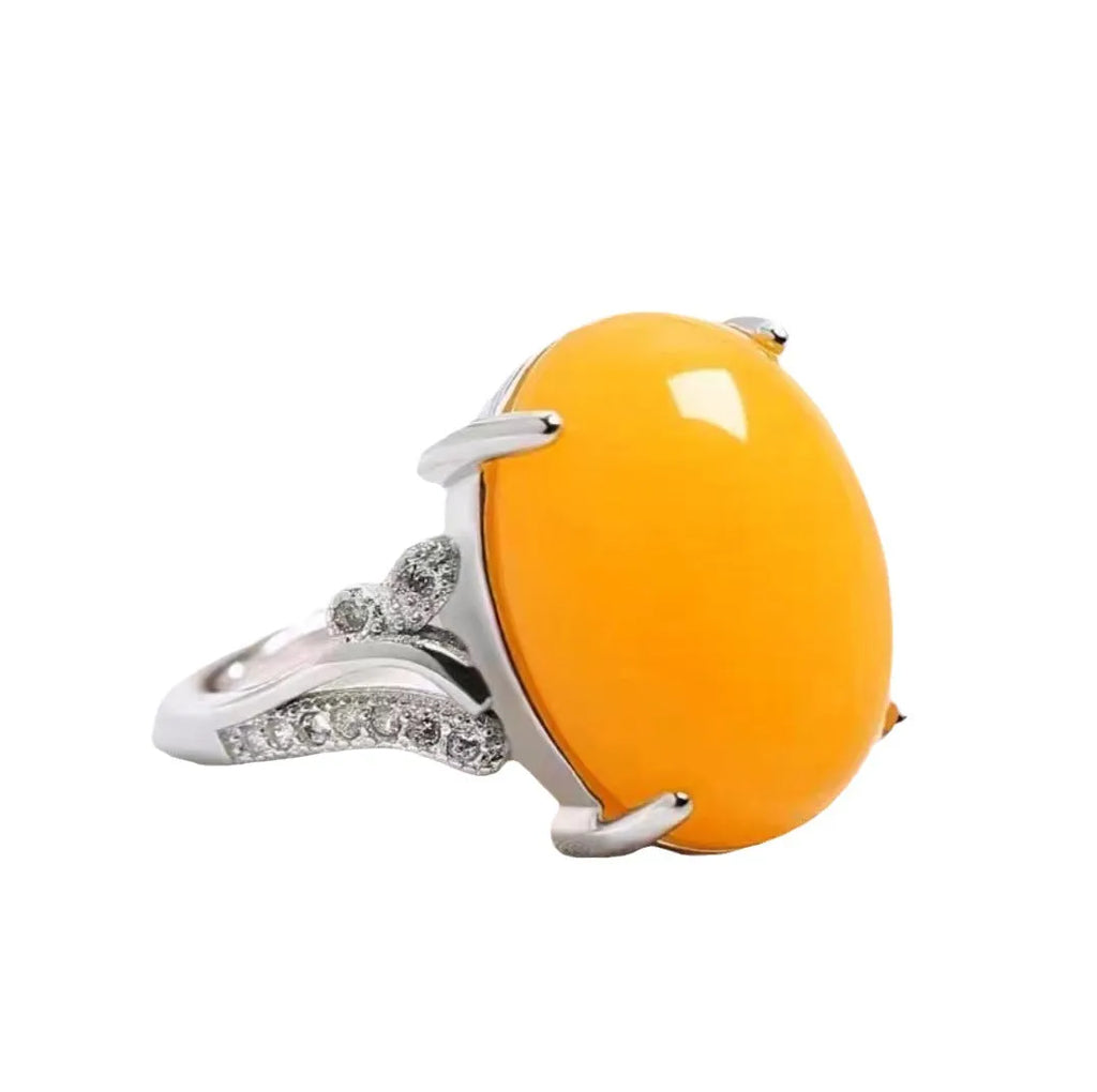 Adjustable geometric alloy ring with ethnic style in blue, shown on a finger.