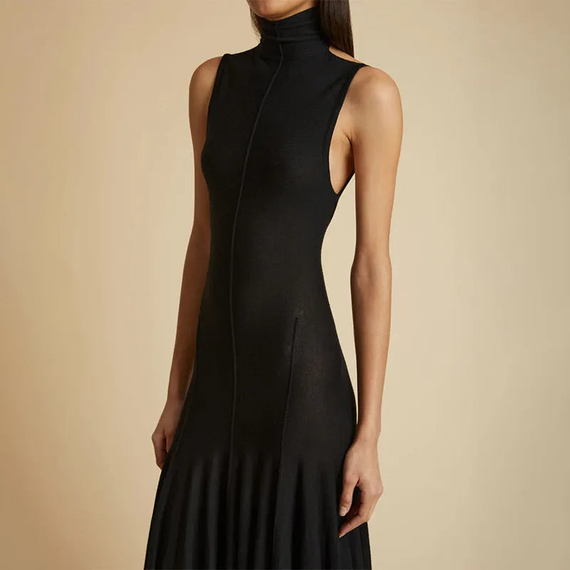 Grey women's slim-fit dress with half turtleneck, backless design, high waist, and sleeveless cut