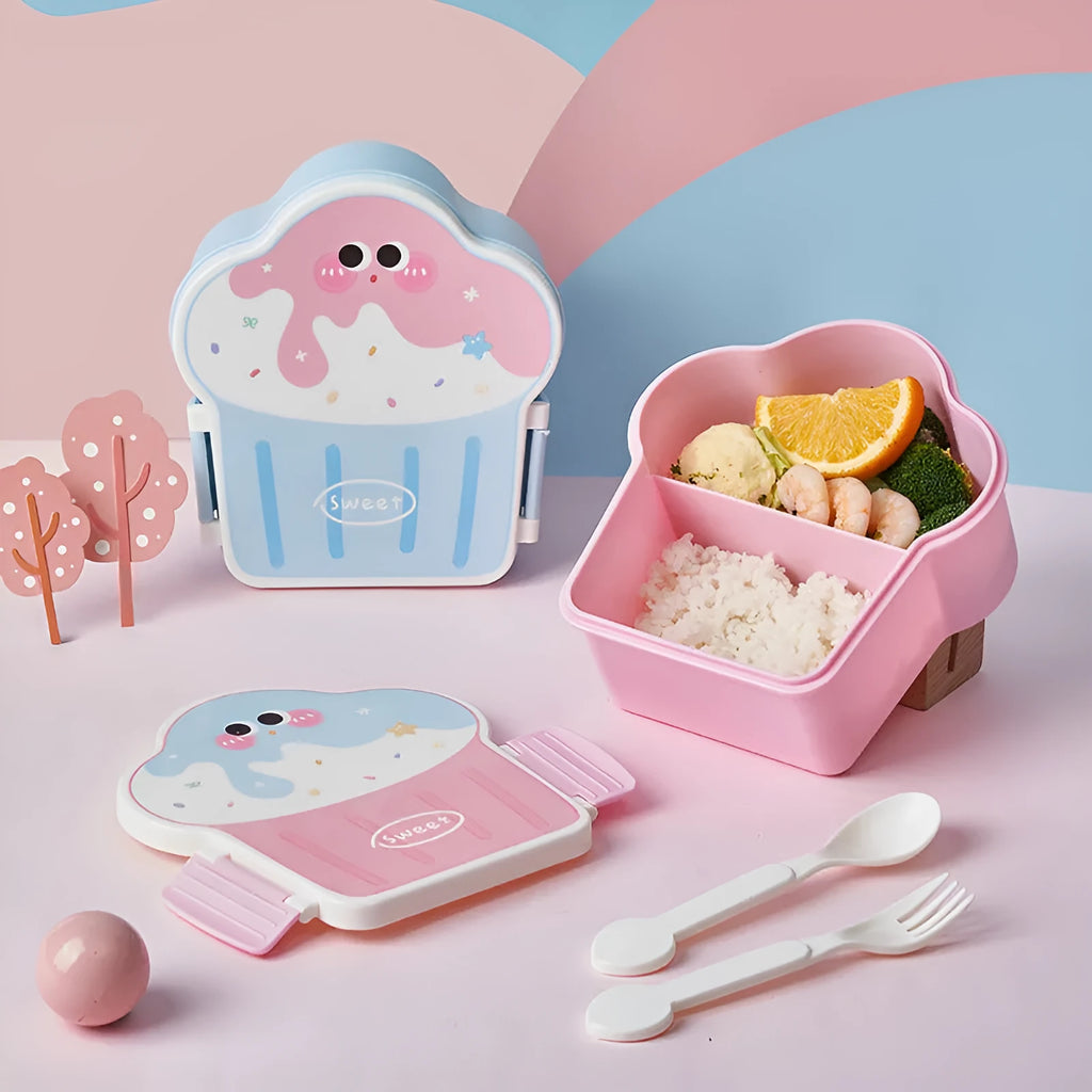 Blue and pink creative ice cream shaped plastic lunch box with spoon and fork set on a table.