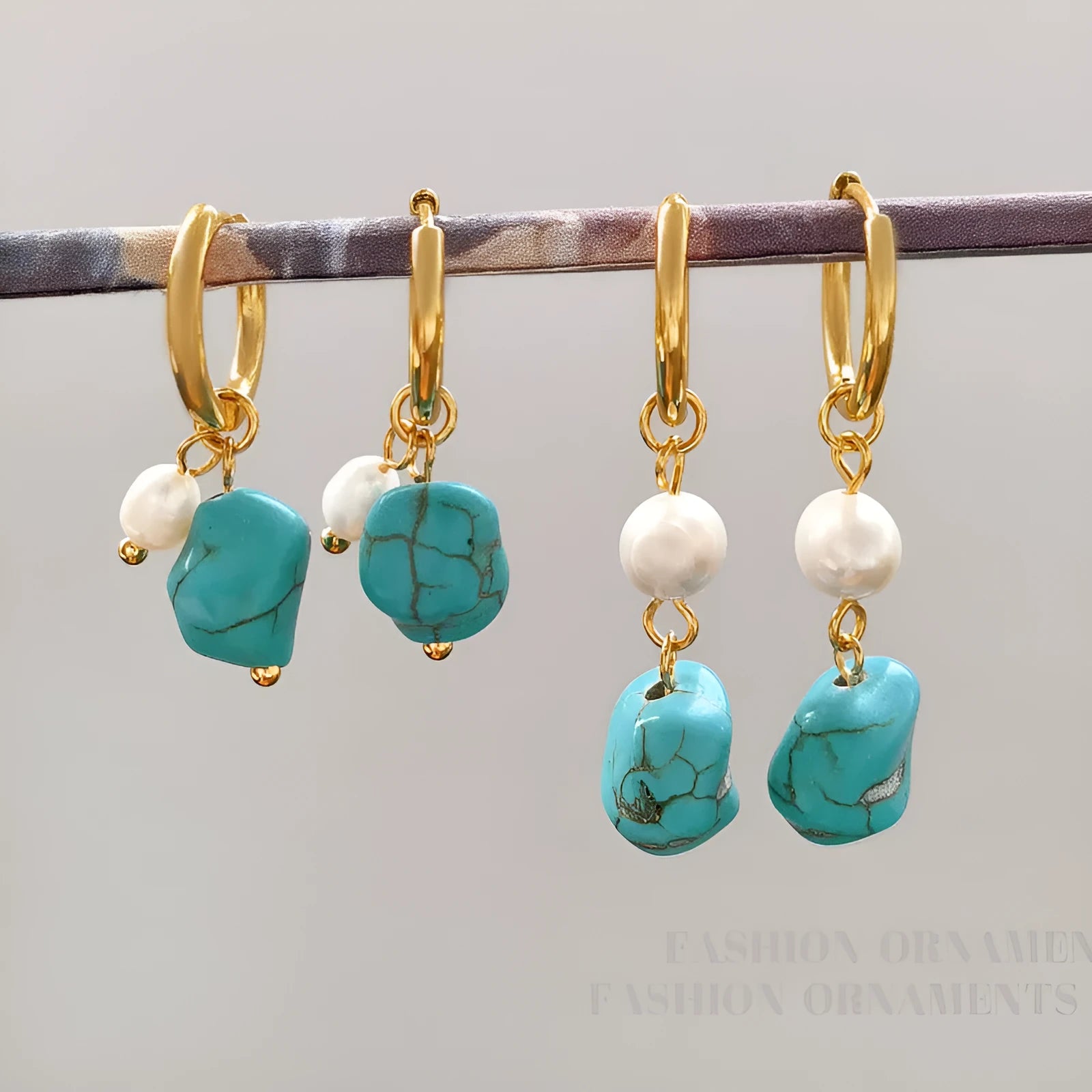 Copper geometric earring set with irregular turquoise stones and cultured pearls, showing both short and dangle drop styles.