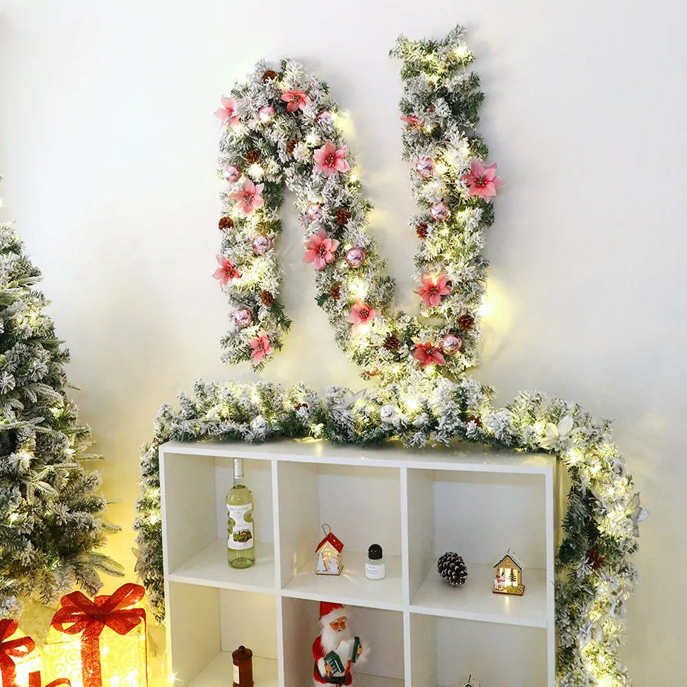 American-style red flocked PVC rattan Christmas garland decoration draped over a mantelpiece.