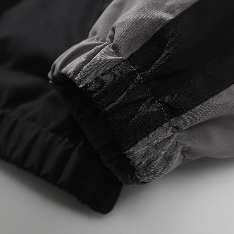Men's casual jacket with contrast stitching design in black colour showing side seam pockets and loose fit