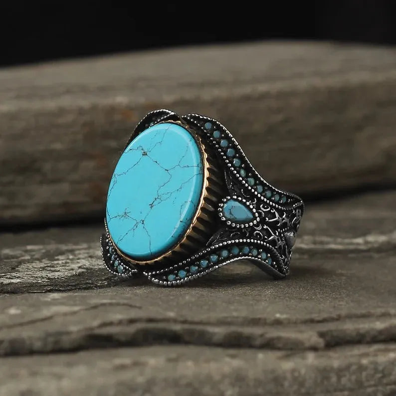Men's antique silver alloy ring with turquoise stone on circular band