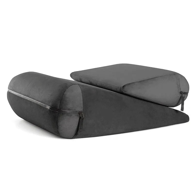 High density triangle furniture cushion pillow with embroidery detail.