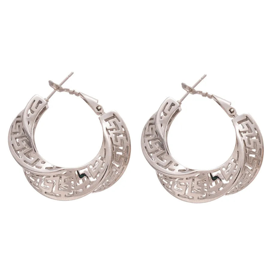 Gold and silver geometric women's hollow stud earrings with a twisted round design.