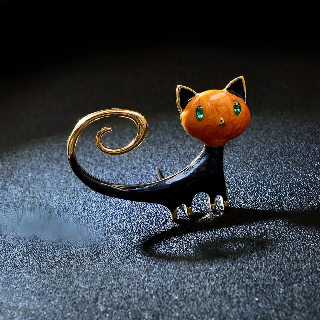 Personalised painted alloy brooch showing a cat design with raised tail, in orange and white colour options