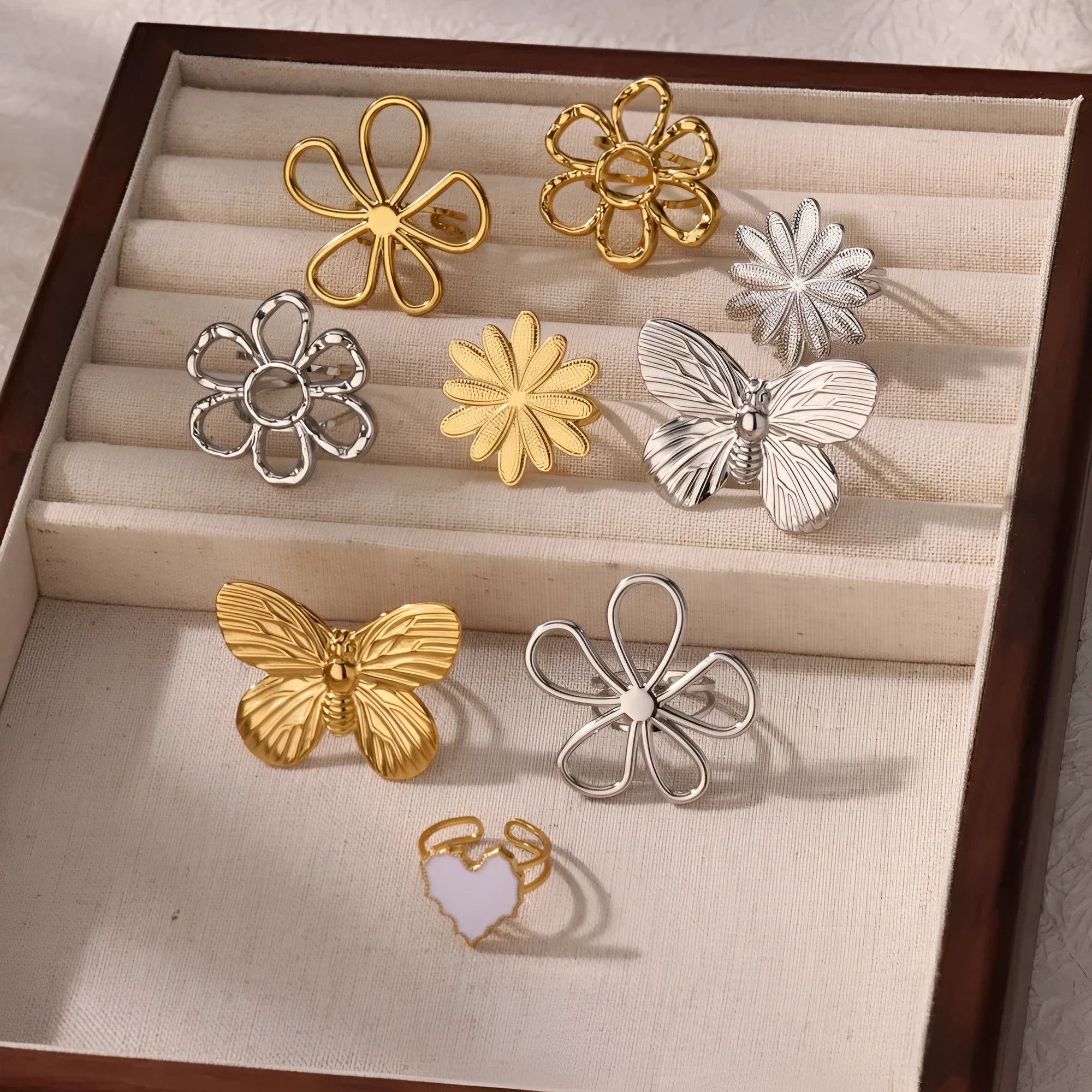 Stainless steel open mouth hollow flower ring for women in gold finish, JZ7020 series