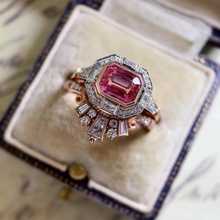 Retro-style rose gold women's alloy ring with geometric shape and ruby design.