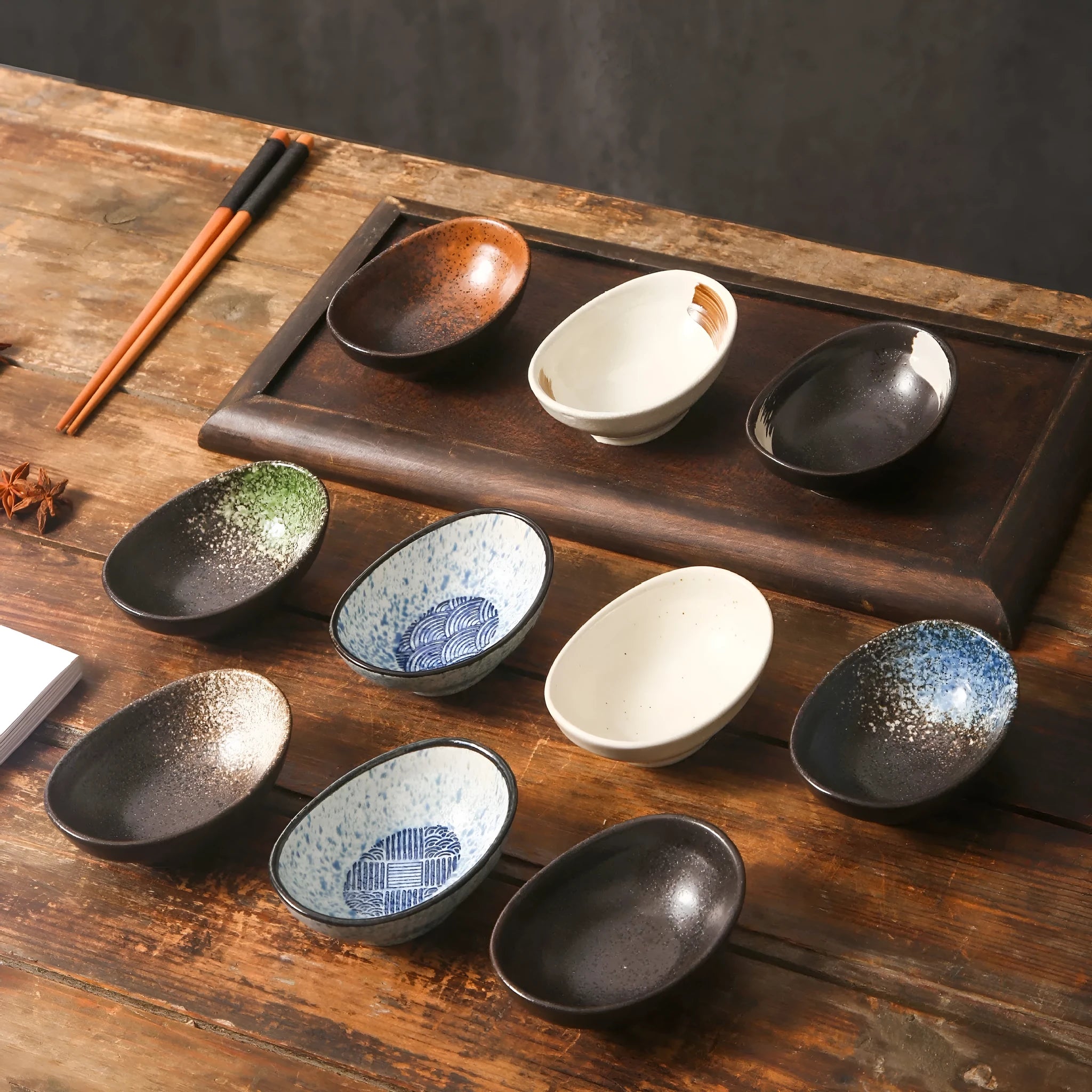 Oval Japanese ceramic sauce dipping bowl with traditional Edo pattern design