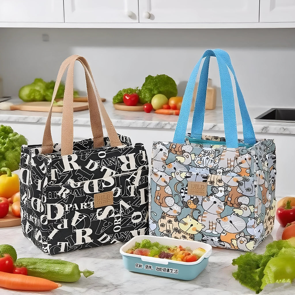 Women's square canvas handbag with floral and animal prints, showing aluminium hardware.