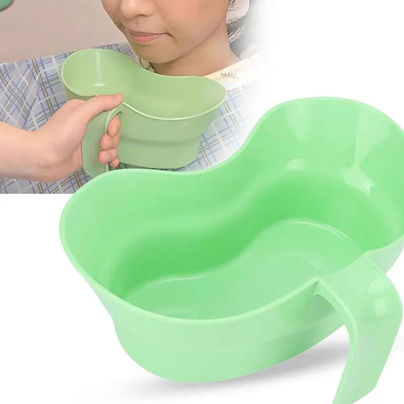 Green plastic nursing gargle cup with spout for bedridden patient drinking assistance