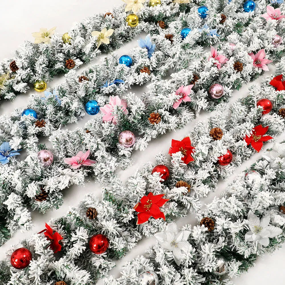 American-style red flocked PVC rattan Christmas garland decoration draped over a mantelpiece.
